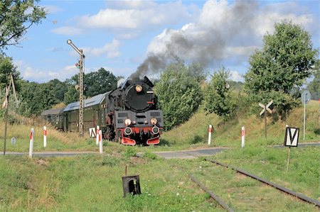 simsearch:400-07680071,k - Old retro steam train passing through polish countryside Photographie de stock - Aubaine LD & Abonnement, Code: 400-05328088