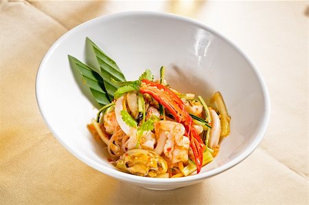 simsearch:400-05335169,k - fresh seafood thai style salad with glass noodles on a bowl close up Stock Photo - Budget Royalty-Free & Subscription, Code: 400-05328459