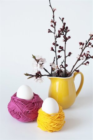 Decorative Easter eggs and a bunch of sprigs of cherry blossoms Stock Photo - Budget Royalty-Free & Subscription, Code: 400-05328580