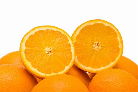 simsearch:400-04243170,k - Two half cut oranges isolated on white Stock Photo - Budget Royalty-Free & Subscription, Code: 400-05328784