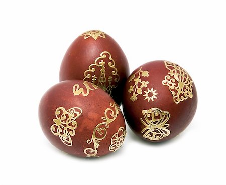 painted happy flowers - three nice gold  decorated Easter eggs closeup over white Stock Photo - Budget Royalty-Free & Subscription, Code: 400-05328891