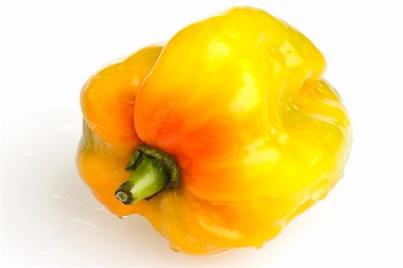 A small yellow pepper East on white background Photographie de stock - Aubaine LD & Abonnement, Code: 400-05328930