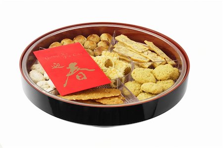 peanut cookie - Chinese new year snack tray with assortment of cookies and red packet Stock Photo - Budget Royalty-Free & Subscription, Code: 400-05328984