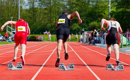 sprinters at finishing line - ready to start the game Stock Photo - Budget Royalty-Free & Subscription, Code: 400-05329137