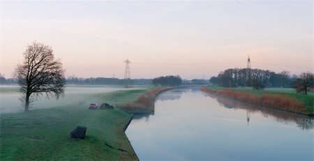 fishermen still sleeping in their tents along a canal in the Netherlands Stock Photo - Budget Royalty-Free & Subscription, Code: 400-05329379