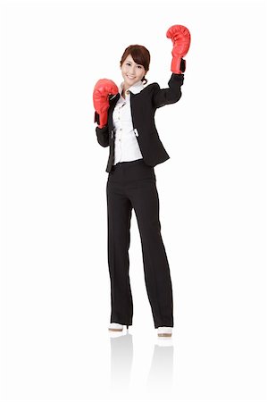 Happy smiling business with red boxing glove, full length portrait isolated on white background. Stock Photo - Budget Royalty-Free & Subscription, Code: 400-05329390