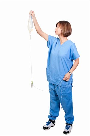 simsearch:400-04501269,k - A beautiful young Asian female doctor holding an IV bag Stock Photo - Budget Royalty-Free & Subscription, Code: 400-05329748
