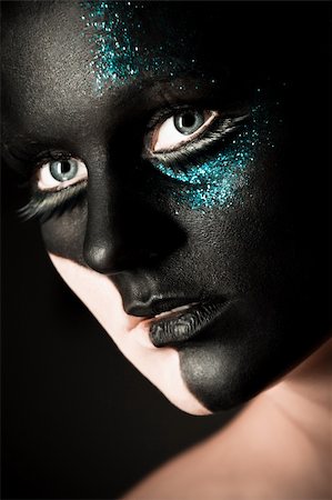 Vogue style portrait of a woman with black makeup Stock Photo - Budget Royalty-Free & Subscription, Code: 400-05329859