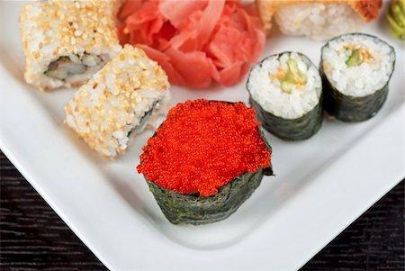 flying dish nobody - japanese sushi set with red tobiko sushi in the foreground Stock Photo - Budget Royalty-Free & Subscription, Code: 400-05329880
