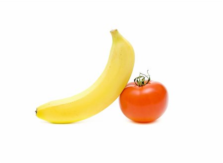 evgenyi (artist) - banana and tomato closeup on white background Stock Photo - Budget Royalty-Free & Subscription, Code: 400-05320043