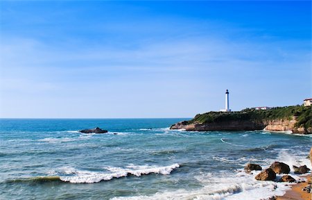 white lighthouse, blue sky, beacon Stock Photo - Budget Royalty-Free & Subscription, Code: 400-05320138