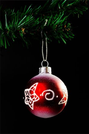 single christmas ball ornament - red ball on the artificial Christmas tree Stock Photo - Budget Royalty-Free & Subscription, Code: 400-05320302