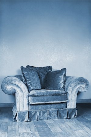 simsearch:400-04840458,k - Beautiful big armchair with soft pillows in an apartment Stock Photo - Budget Royalty-Free & Subscription, Code: 400-05320329