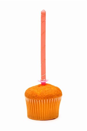 Cupcake and candle isolated on the white background Stock Photo - Budget Royalty-Free & Subscription, Code: 400-05320474