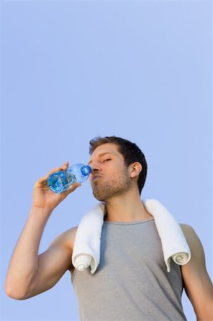 simsearch:400-05104948,k - Man drinking water after the gym Stock Photo - Budget Royalty-Free & Subscription, Code: 400-05320808