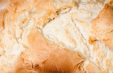 Closeup of a crispy fresh backed homemade bread Foto de stock - Super Valor sin royalties y Suscripción, Código: 400-05321825