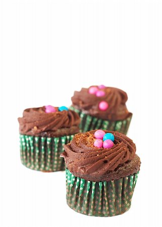 simsearch:400-05316582,k - Miniature decorated chocolate cupcakes on white background Stock Photo - Budget Royalty-Free & Subscription, Code: 400-05322026