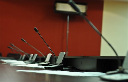 empty classroom wall - Conference table, microphones close-up Stock Photo - Budget Royalty-Free & Subscription, Code: 400-05322269