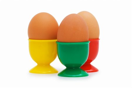 simsearch:400-04506882,k - Brown egg in holder isolated on white Foto de stock - Super Valor sin royalties y Suscripción, Código: 400-05322948