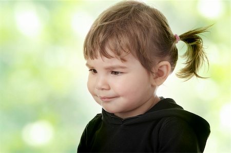 simsearch:400-05739745,k - Portrait of a 2 year old girl against abstract green background Stock Photo - Budget Royalty-Free & Subscription, Code: 400-05322978