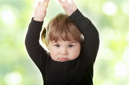 simsearch:400-05739745,k - Portrait of a 2 year old girl against abstract green background Stock Photo - Budget Royalty-Free & Subscription, Code: 400-05322980