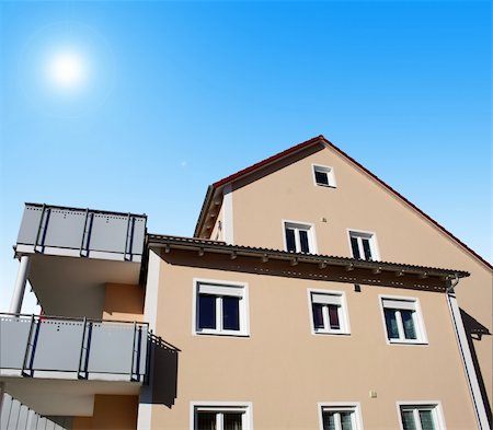 family at sky pool - A beautiful house on a sunny day Stock Photo - Budget Royalty-Free & Subscription, Code: 400-05323055