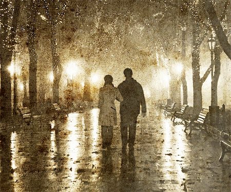 Couple walking at alley in night lights. Photo in vintage yellow style. Stock Photo - Budget Royalty-Free & Subscription, Code: 400-05323142