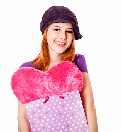 simsearch:400-04393054,k - Beautiful red-haired girl with heart in bag. Studio shot. Foto de stock - Super Valor sin royalties y Suscripción, Código: 400-05323361