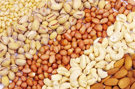 simsearch:400-04377067,k - Varieties of nuts: peanuts, hazelnuts, cashews, pistachio Stock Photo - Budget Royalty-Free & Subscription, Code: 400-05323584