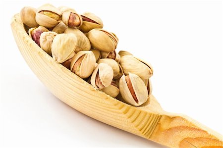 simsearch:400-05265990,k - a lot of pistachios in a wooden spoon Stock Photo - Budget Royalty-Free & Subscription, Code: 400-05334127