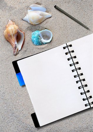 school cone - open notepad with pen and shell on the sand background Stock Photo - Budget Royalty-Free & Subscription, Code: 400-05334173