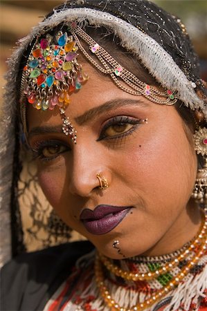 dancers of rajasthan - Beautiful Kalbelia dancer in traditional costume at the annual Sarujkund Fair near Delhi in India. Stock Photo - Budget Royalty-Free & Subscription, Code: 400-05334300