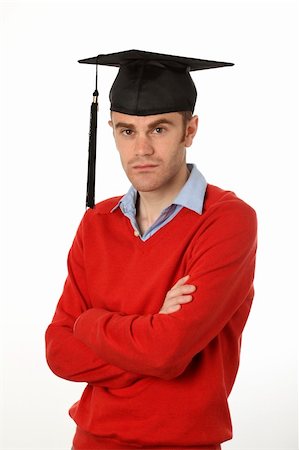 picture of person receiving diploma - young man standing with graduation hat looking serious Stock Photo - Budget Royalty-Free & Subscription, Code: 400-05334437