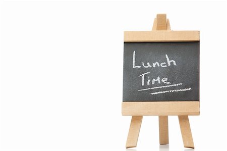 simsearch:400-07971845,k - Chalkboard with the words lunch time written on it isolated against a white background Stock Photo - Budget Royalty-Free & Subscription, Code: 400-05335118