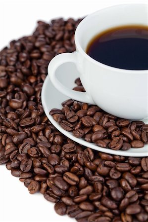 simsearch:400-05371796,k - Cup of coffee and coffee beans on a white background Stock Photo - Budget Royalty-Free & Subscription, Code: 400-05335156