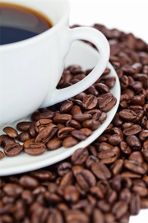 simsearch:400-05371796,k - Cup of coffee and coffee beans on a white background Stock Photo - Budget Royalty-Free & Subscription, Code: 400-05335157