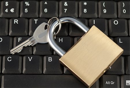 simsearch:400-04359676,k - Padlock on a keyboard Stock Photo - Budget Royalty-Free & Subscription, Code: 400-05335165