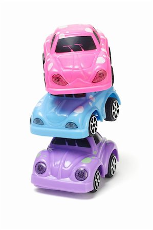 simsearch:400-05292821,k - Stack of colorful plastic toy cars on white background Stock Photo - Budget Royalty-Free & Subscription, Code: 400-05335430