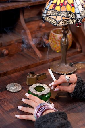 Female hands smoking Stock Photo - Budget Royalty-Free & Subscription, Code: 400-05335472