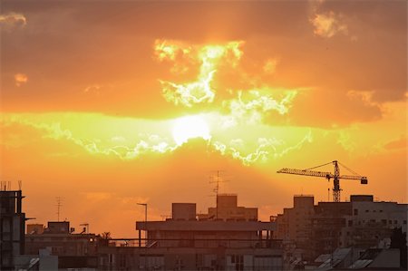 rooftop silhouette - House building crane silhouettes against red evening sky Stock Photo - Budget Royalty-Free & Subscription, Code: 400-05336019