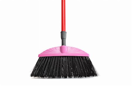 Closeup of nice modern plastic pink broom on white background Stock Photo - Budget Royalty-Free & Subscription, Code: 400-05336023