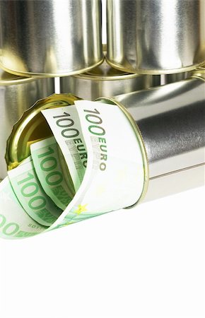 simsearch:700-00047827,k - euro bills on a tin can over white background Stockbilder - Microstock & Abonnement, Bildnummer: 400-05336161