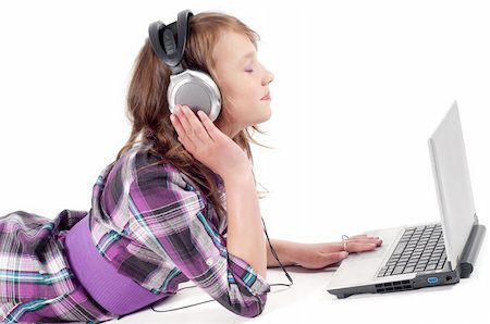 simsearch:400-06517383,k - Teenager girl with laptop in studio isolated on white Fotografie stock - Microstock e Abbonamento, Codice: 400-05336875