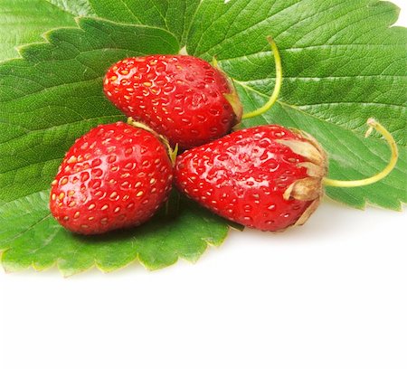simsearch:400-06076486,k - three strawberries isolated on white Foto de stock - Royalty-Free Super Valor e Assinatura, Número: 400-05336922
