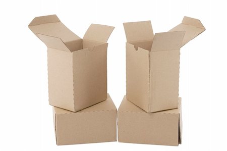 simsearch:400-04354403,k - Brown cardboard boxes arranged in stack on white background Photographie de stock - Aubaine LD & Abonnement, Code: 400-05337253