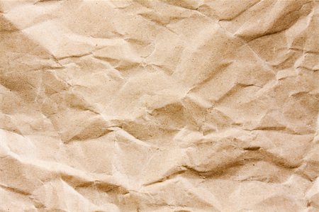sheet of paper wrinkled - A plain wrinkled brown paper. Stock Photo - Budget Royalty-Free & Subscription, Code: 400-05337424