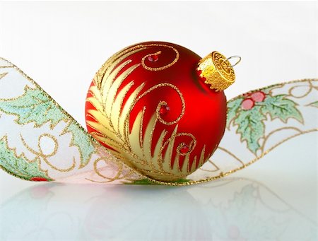 simsearch:400-04776548,k - Red Christmas ball with a curly ribbon Stock Photo - Budget Royalty-Free & Subscription, Code: 400-05337561