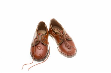 simsearch:400-05701597,k - Baby shoes isolated on the white background Foto de stock - Royalty-Free Super Valor e Assinatura, Número: 400-05337610