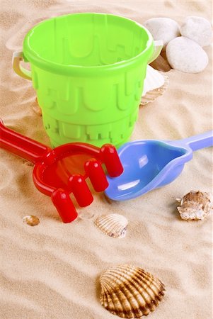 sandbox - Children's toys -  bucket, spade and shovel on sand Stock Photo - Budget Royalty-Free & Subscription, Code: 400-05338198