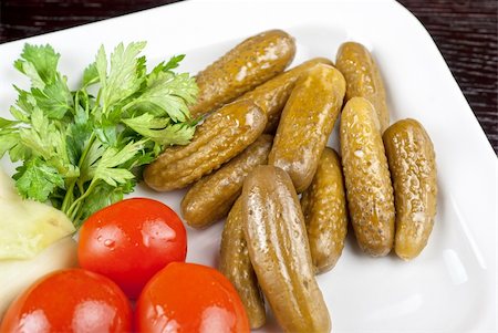 pickling gherkin - pickled vegetables of tomato, cucumber and cabbage Stock Photo - Budget Royalty-Free & Subscription, Code: 400-05338877